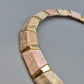 Elegante Vintage Kette mit Steinsegmenten und Goldakzenten