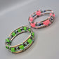 Set aus 2 bunten Wickelarmbändern mit Nazar-Auge-Perlen