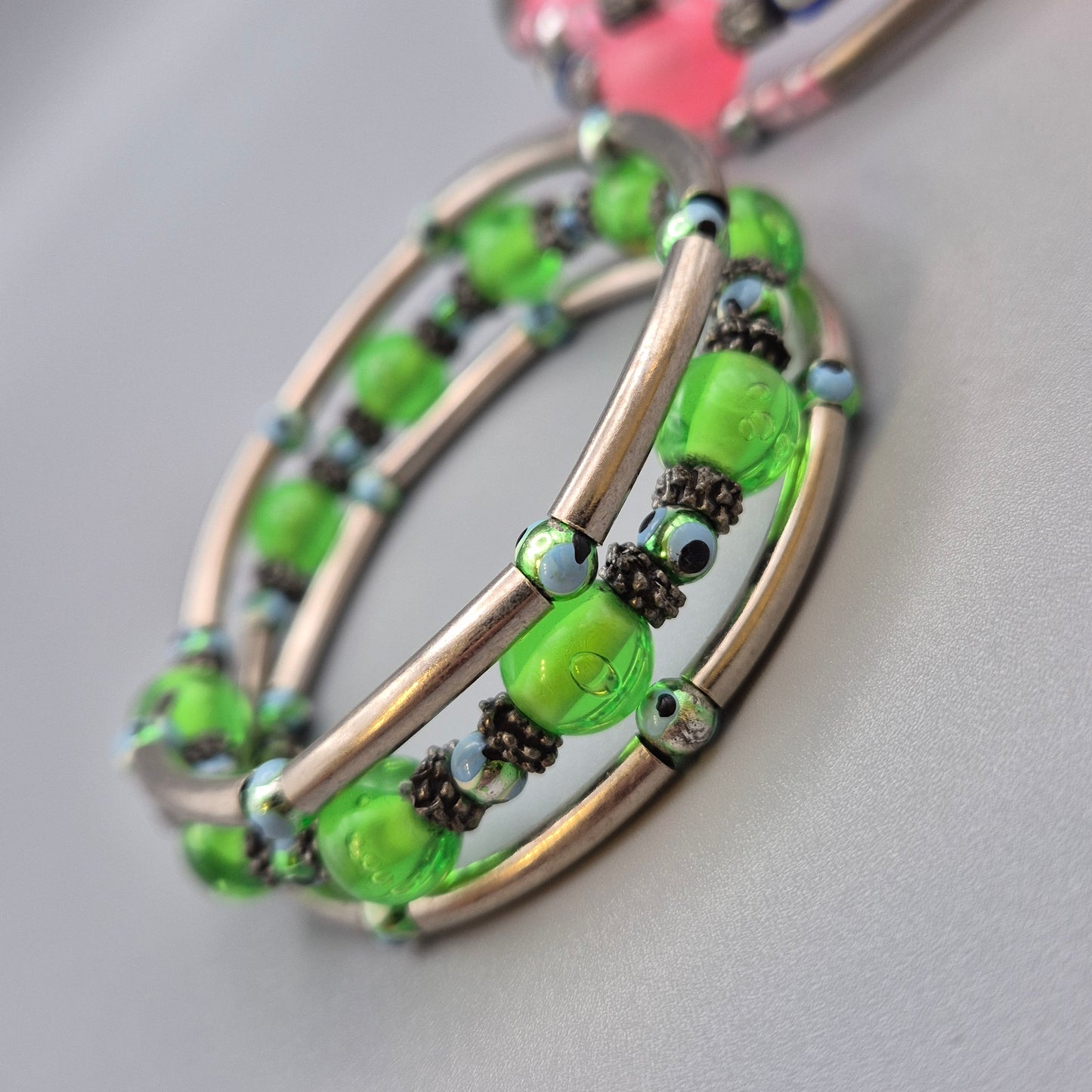 Set aus 2 bunten Wickelarmbändern mit Nazar-Auge-Perlen