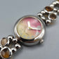 Vintage Q&Q Damen Armbanduhr mit abstraktem Gliederarmband