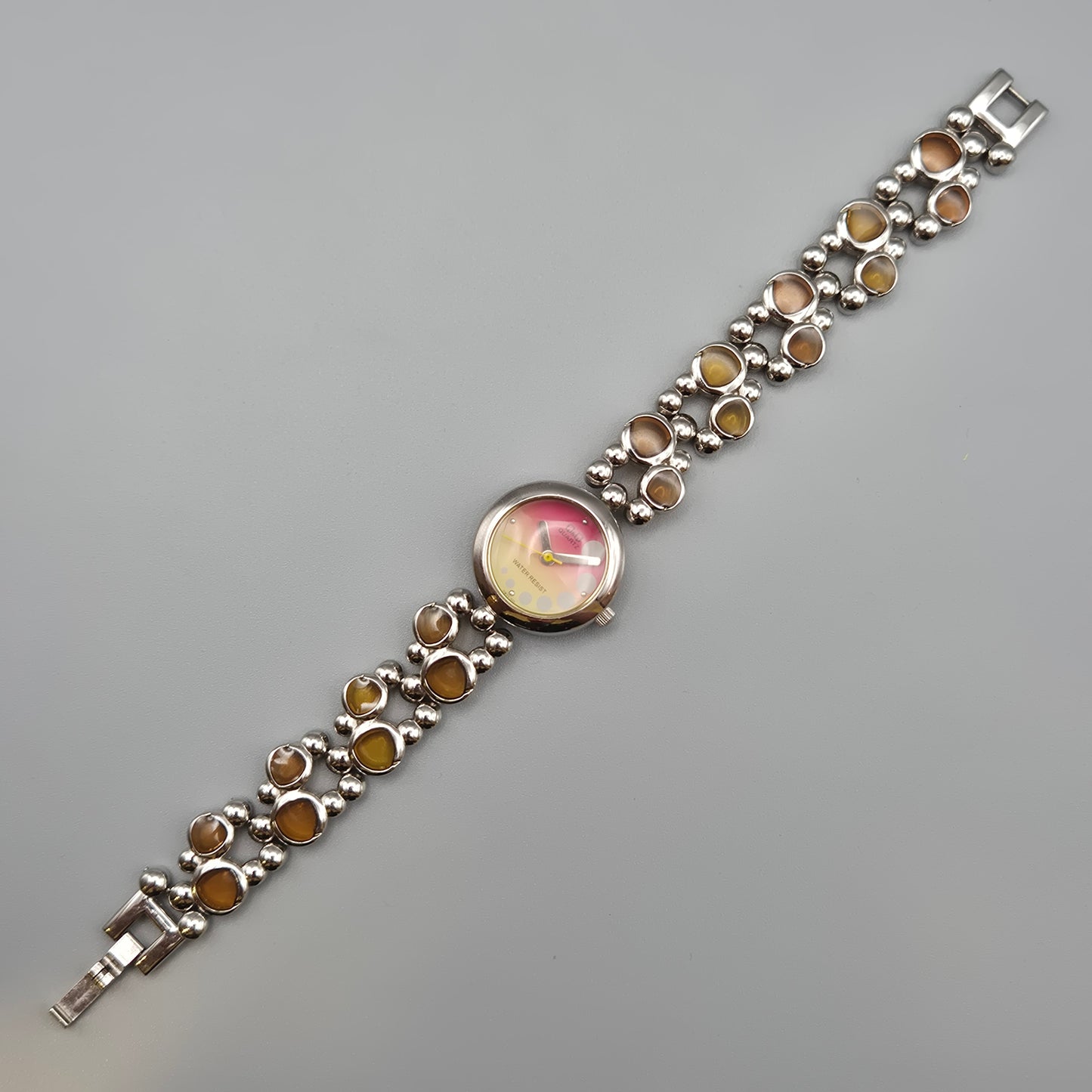 Vintage Q&Q Damen Armbanduhr mit abstraktem Gliederarmband