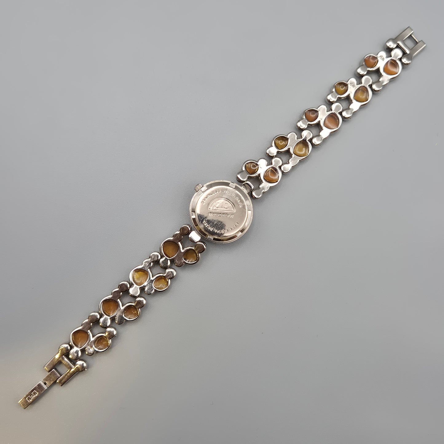 Vintage Q&Q Damen Armbanduhr mit abstraktem Gliederarmband