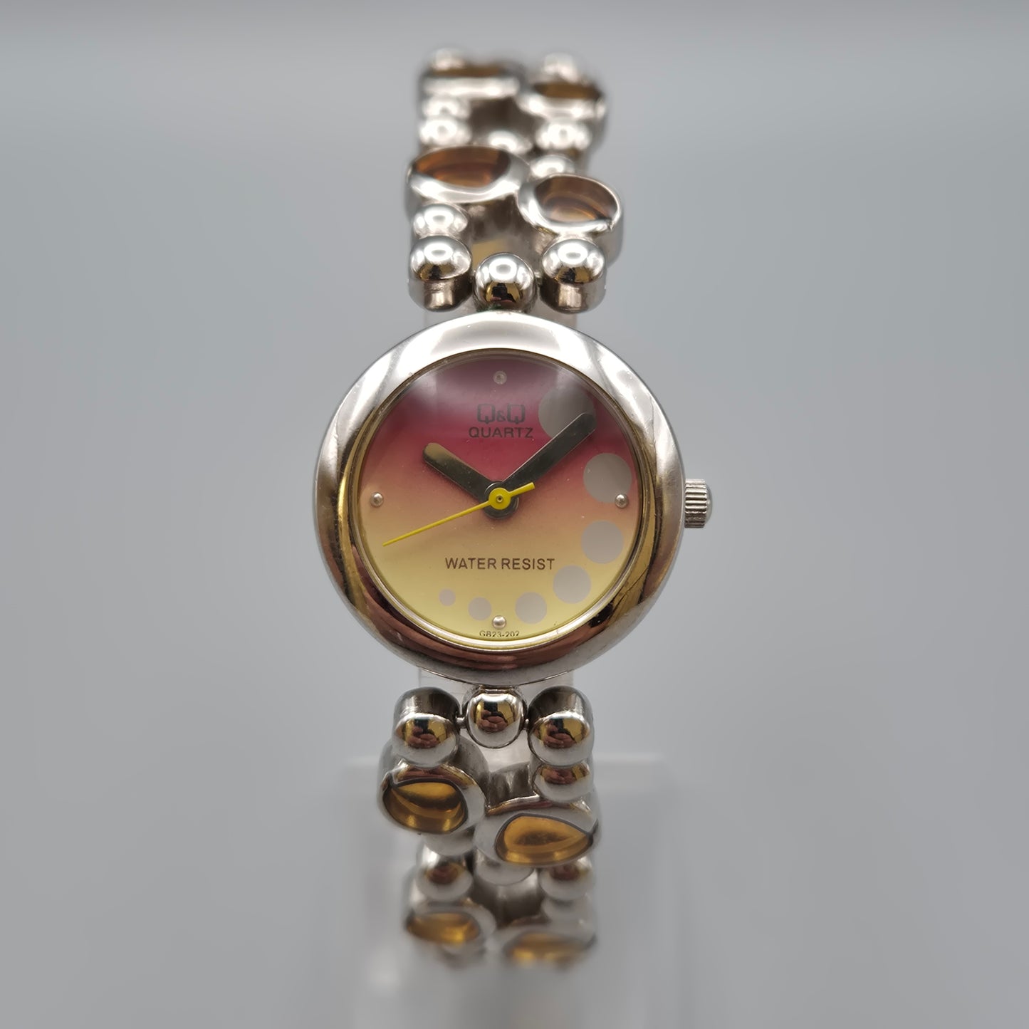 Vintage Q&Q Damen Armbanduhr mit abstraktem Gliederarmband