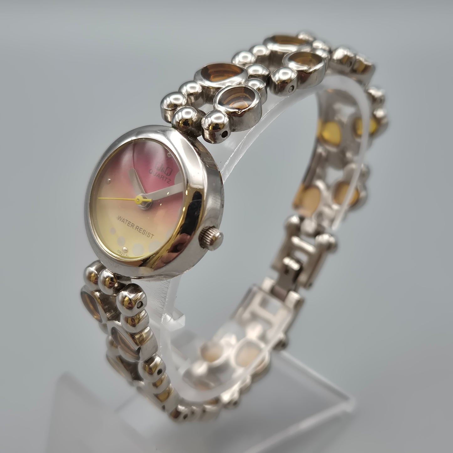 Vintage Q&Q Damen Armbanduhr mit abstraktem Gliederarmband