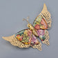 Vintage Schmetterlingsbrosche mit glitzernden Emaille Akzenten