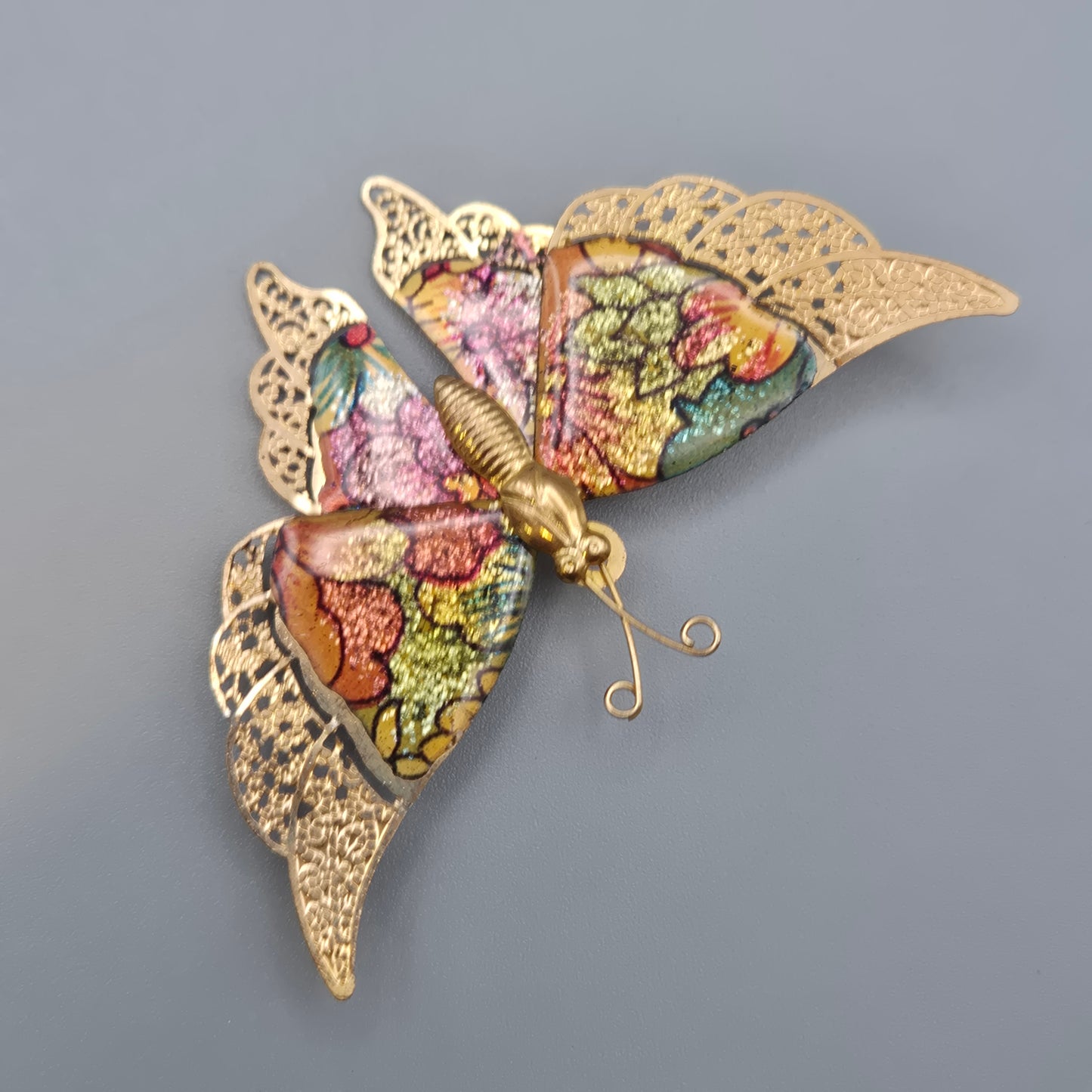 Vintage Schmetterlingsbrosche mit glitzernden Emaille Akzenten