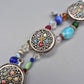 Buntes Vintage Armband mit drei kunstvollen Ornament-Elementen