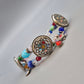 Buntes Vintage Armband mit drei kunstvollen Ornament-Elementen
