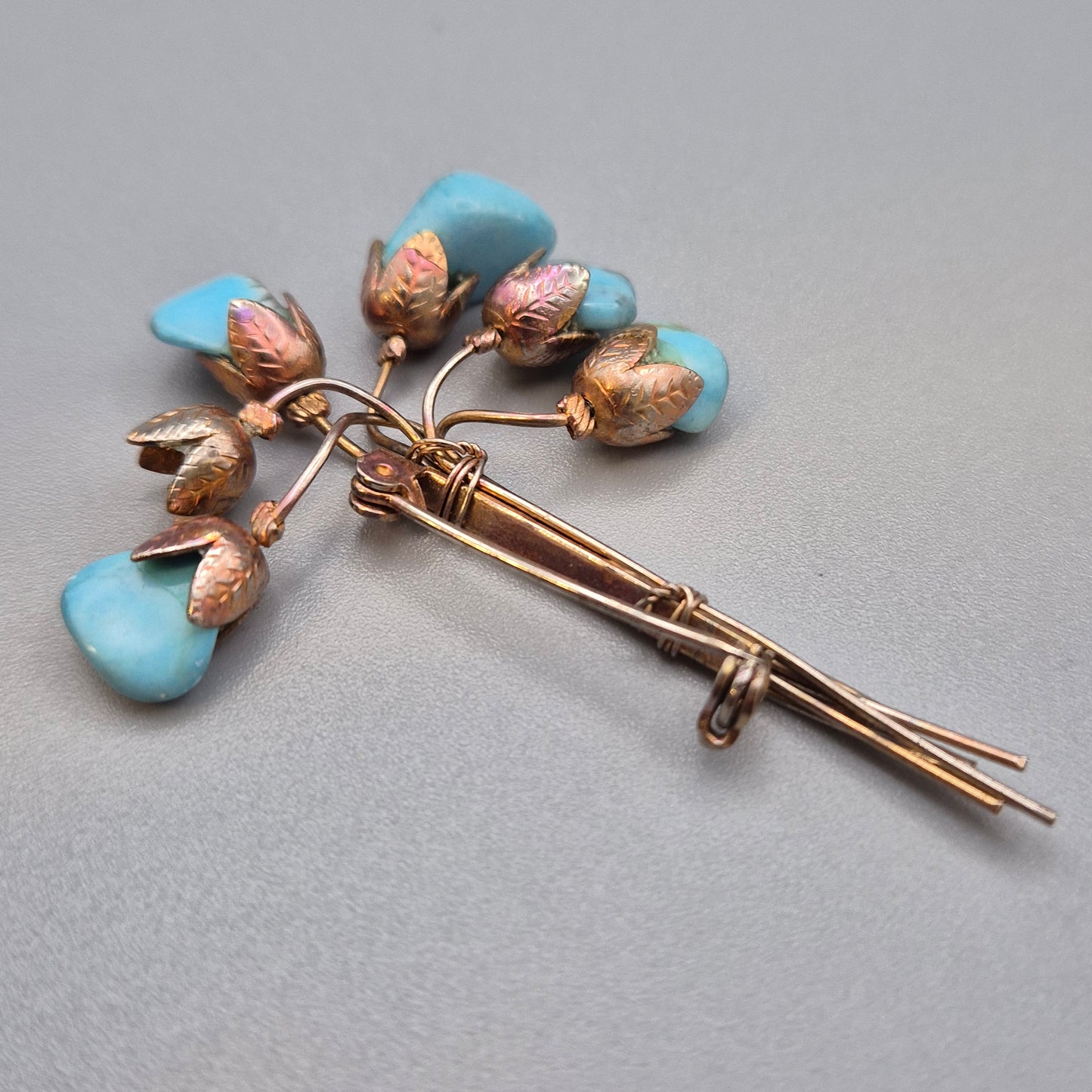Vintage Blumen Brosche mit Türkis Steinen Goldfarben