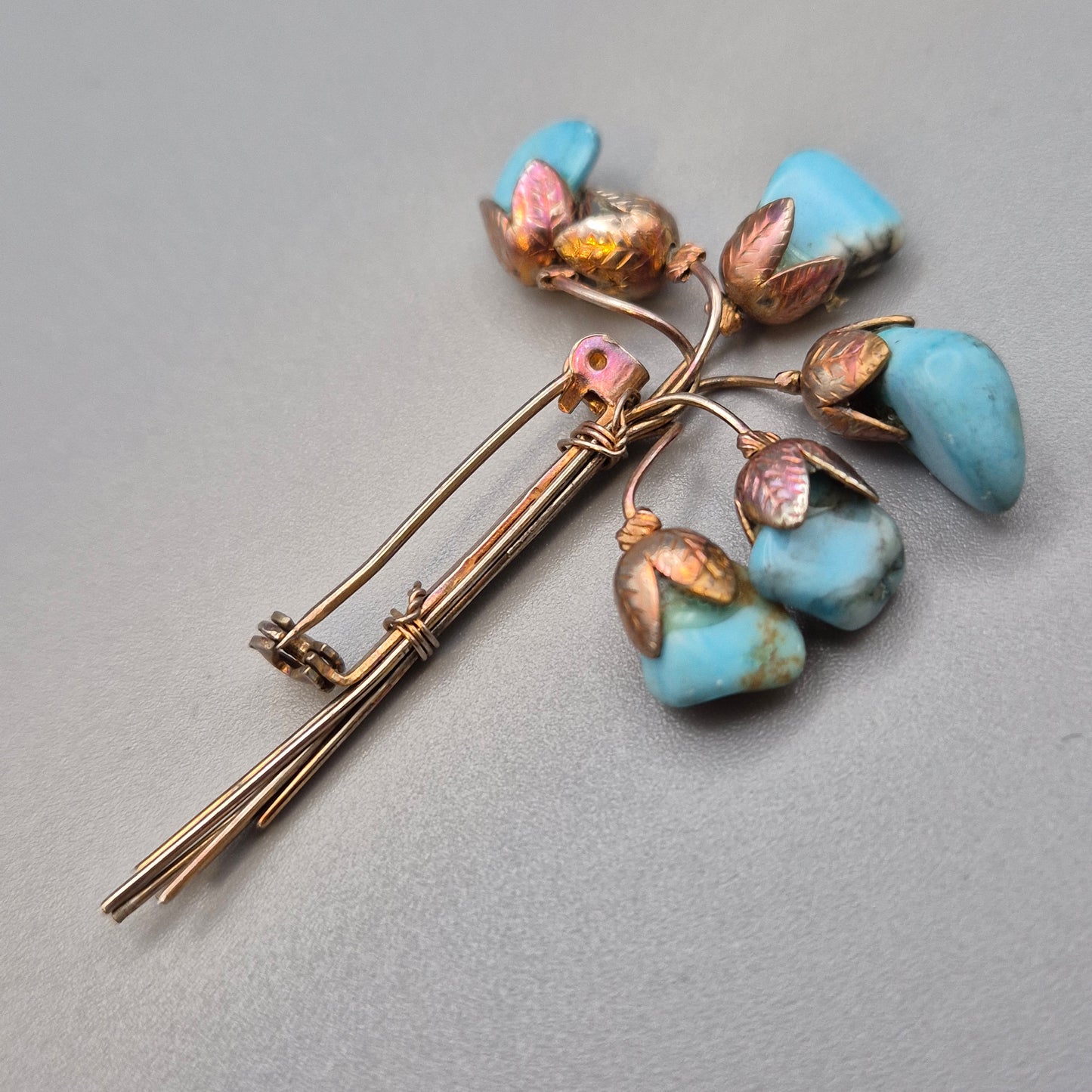 Vintage Blumen Brosche mit Türkis Steinen Goldfarben