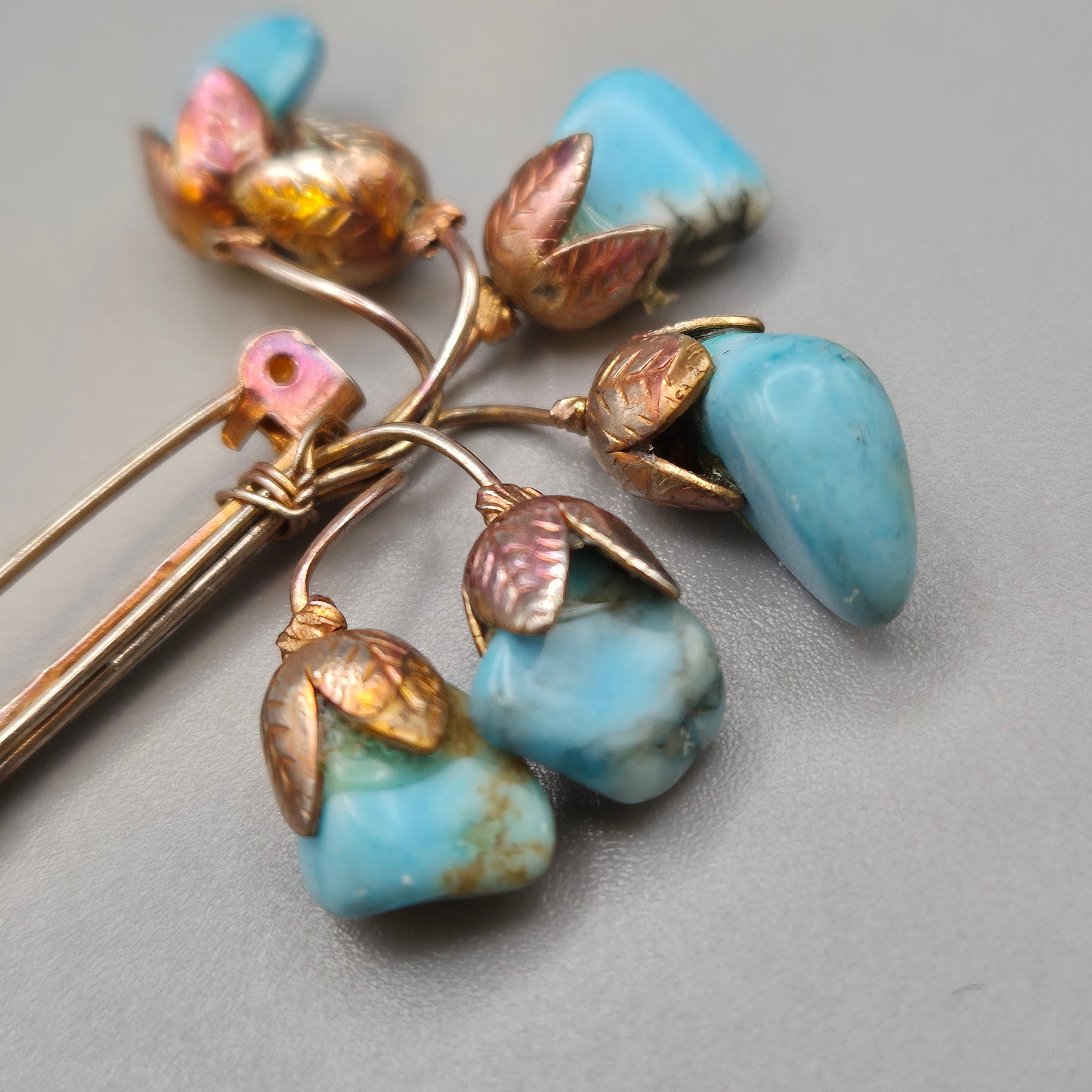 Vintage Blumen Brosche mit Türkis Steinen Goldfarben