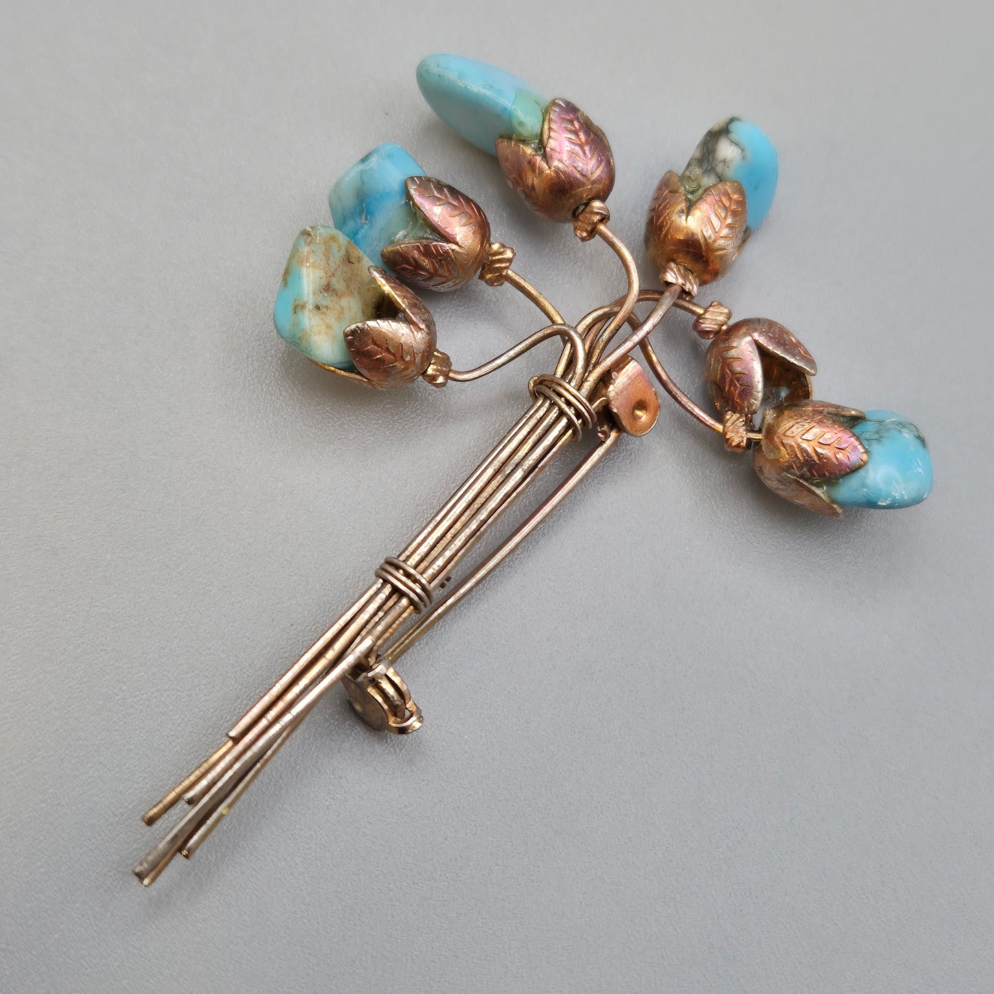 Vintage Blumen Brosche mit Türkis Steinen Goldfarben