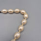 Elegante Vintage Perlenkette mit ovalen Perlen weiß