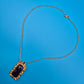 Vintage Kette mit dunkelblauem rechteckigem Anhänger in Goldoptik