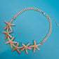 Goldfarbene Seestern Statement Kette im maritimen Design