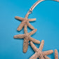 Goldfarbene Seestern Statement Kette im maritimen Design