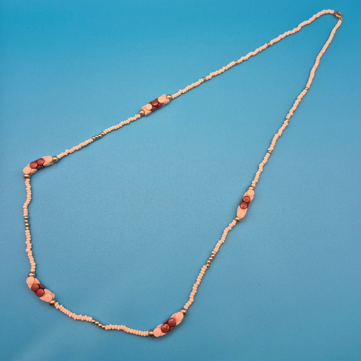 Vintage Kette mit Holzperlen und Goldakzenten 40 cm