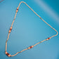 Vintage Kette mit Holzperlen und Goldakzenten 40 cm