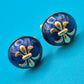 Vintage Manschettenknöpfe mit blauer Emaille und Lilien-Emblem