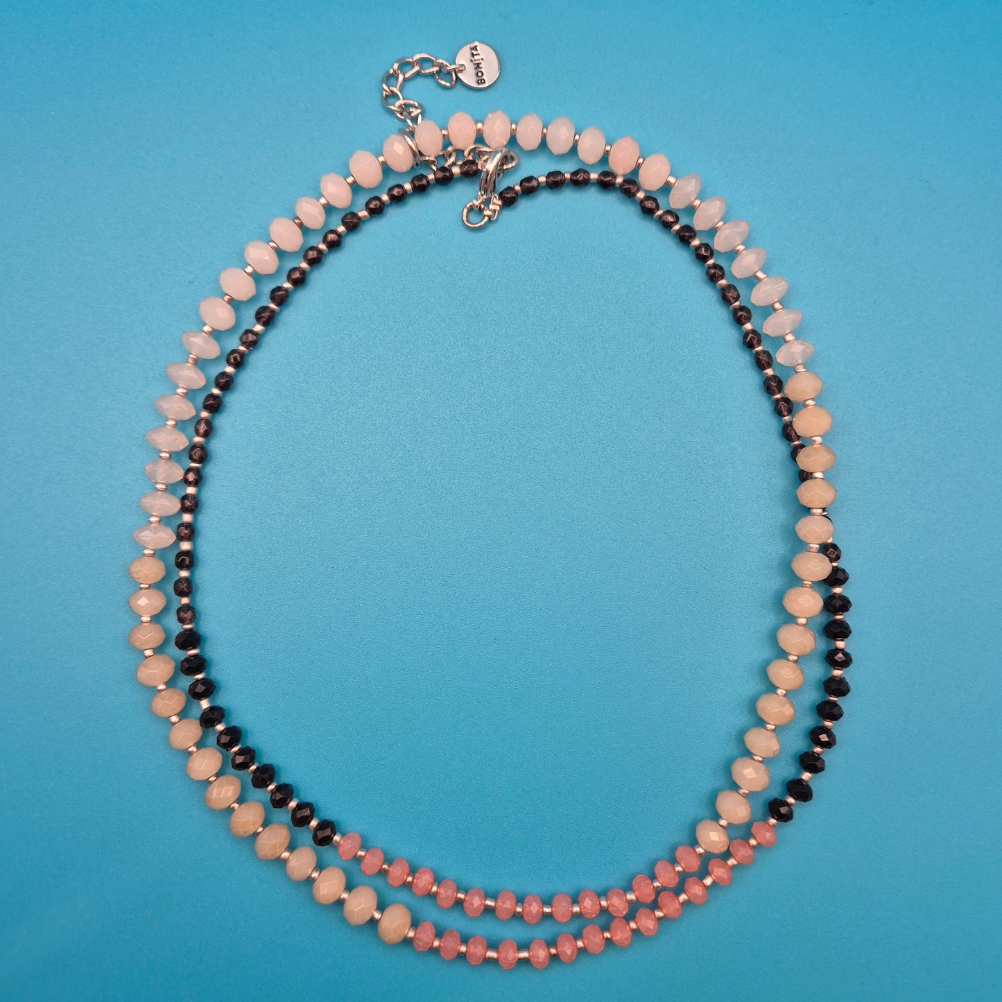 Elegante Bonita Designer-Kette mit facettierten Perlen in Rosé und Schwarz