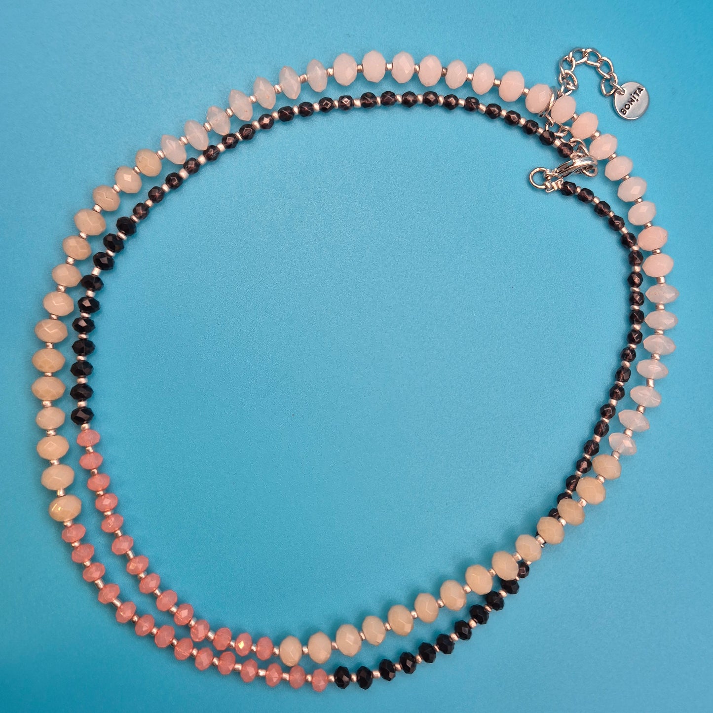 Elegante Bonita Designer-Kette mit facettierten Perlen in Rosé und Schwarz