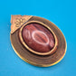 Vintage Brosche mit Tigerauge Cabochon & filigraner Metall-Ornamentik