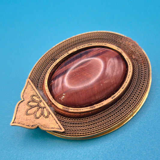 Vintage Brosche mit Tigerauge Cabochon & filigraner Metall-Ornamentik