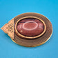 Vintage Brosche mit Tigerauge Cabochon & filigraner Metall-Ornamentik