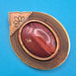 Vintage Brosche mit Tigerauge Cabochon & filigraner Metall-Ornamentik