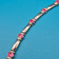 Vintage Armband in Silber-Optik mit pinken Zirkonia-Steinen