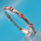Vintage Armband in Silber-Optik mit pinken Zirkonia-Steinen