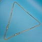 Vintage Goldfarbene Kette mit zwei Zierelementen