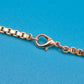 Vintage Goldfarbene Kette mit zwei Zierelementen