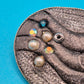 Vintage Brosche in Mond-Optik mit Opal-Cabochon und Perlenbesatz