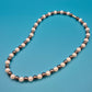 Elegante Vintage-Kette mit Perlen und anthrazitfarbenen Metallperlen