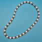 Elegante Vintage-Kette mit Perlen und anthrazitfarbenen Metallperlen
