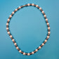Elegante Vintage-Kette mit Perlen und anthrazitfarbenen Metallperlen