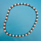 Elegante Vintage-Kette mit Perlen und anthrazitfarbenen Metallperlen