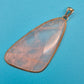 Antiker Anhänger mit großem, facettiertem Rosenquarz in Messingfassung