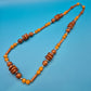 Boho-Statement Kette mit Holzperlen und bernsteinfarbenen Akzenten
