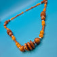 Boho-Statement Kette mit Holzperlen und bernsteinfarbenen Akzenten