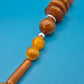 Boho-Statement Kette mit Holzperlen und bernsteinfarbenen Akzenten