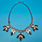 Vintage Statement-Kette mit geschliffenen Schmucksteinen in Anthrazit-Optik