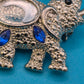 Vintage Elefanten-Brosche in Silber-Optik mit blauen Zirkonia-Akzenten