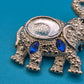 Vintage Elefanten-Brosche in Silber-Optik mit blauen Zirkonia-Akzenten