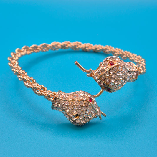 Vintage Doppel-Schlangenkopf Armreif mit Strassbesatz Goldfarben