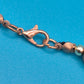 Vintage Statement-Kette mit marmorierten Kugeln in Bronze und Türkis