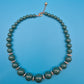 Vintage Statement Kette mit grünen Perlen und silberfarbenen Akzenten