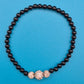 Elegantes Stretch-Armband mit schwarzen Perlen und Kristall-Akzenten