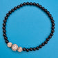 Elegantes Stretch-Armband mit schwarzen Perlen und Kristall-Akzenten